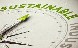 Image of a compass pointing to the word 'sustainable'