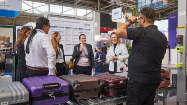 Exhibitors and visitors meet on a stand at inter airport Europe