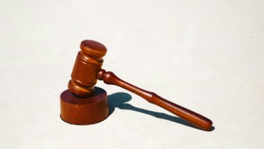 IAE25 blog image of a gavel and block