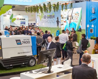 Exhibitors and visitors meet on a stand at inter airport Europe